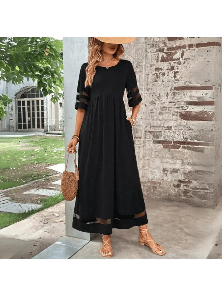 Elegant black midi dress with tummy control for a flattering silhouette.
