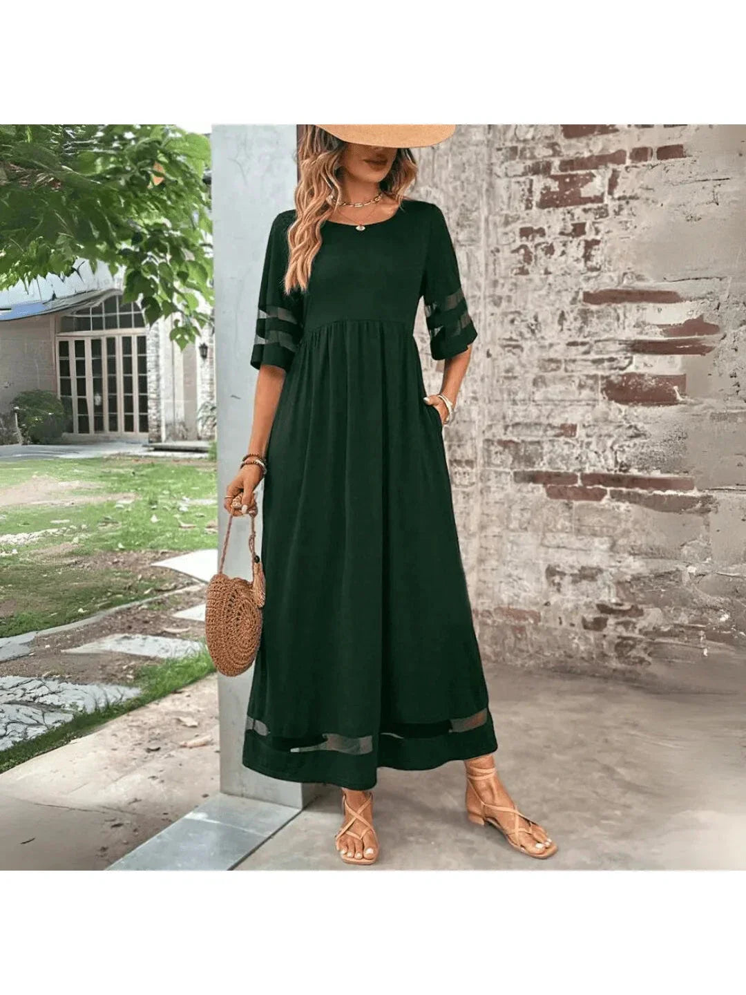 Elegant midi dress in black, designed for a flattering and comfortable fit.