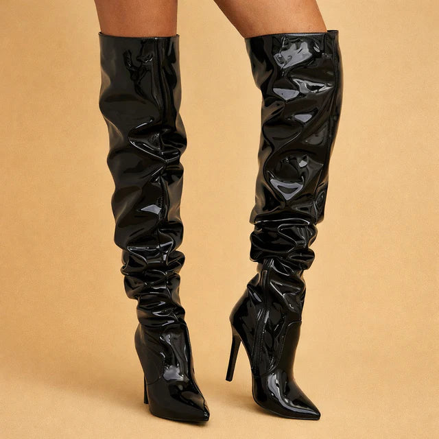 Elegant black over-the-knee boots with chic ruching, pointed toe, and stiletto heel for women's fashion.