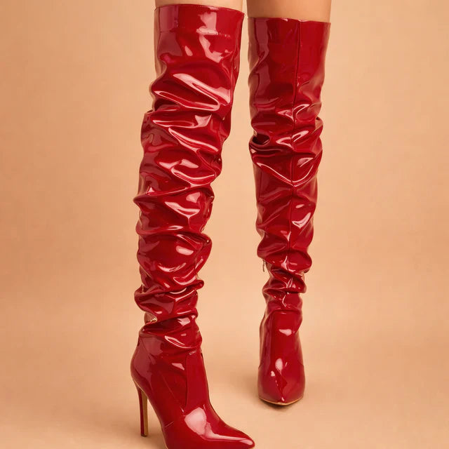 Chic women's tall boots with ruching, pointed toe, and high stiletto heel, perfect for elegant day or evening wear.