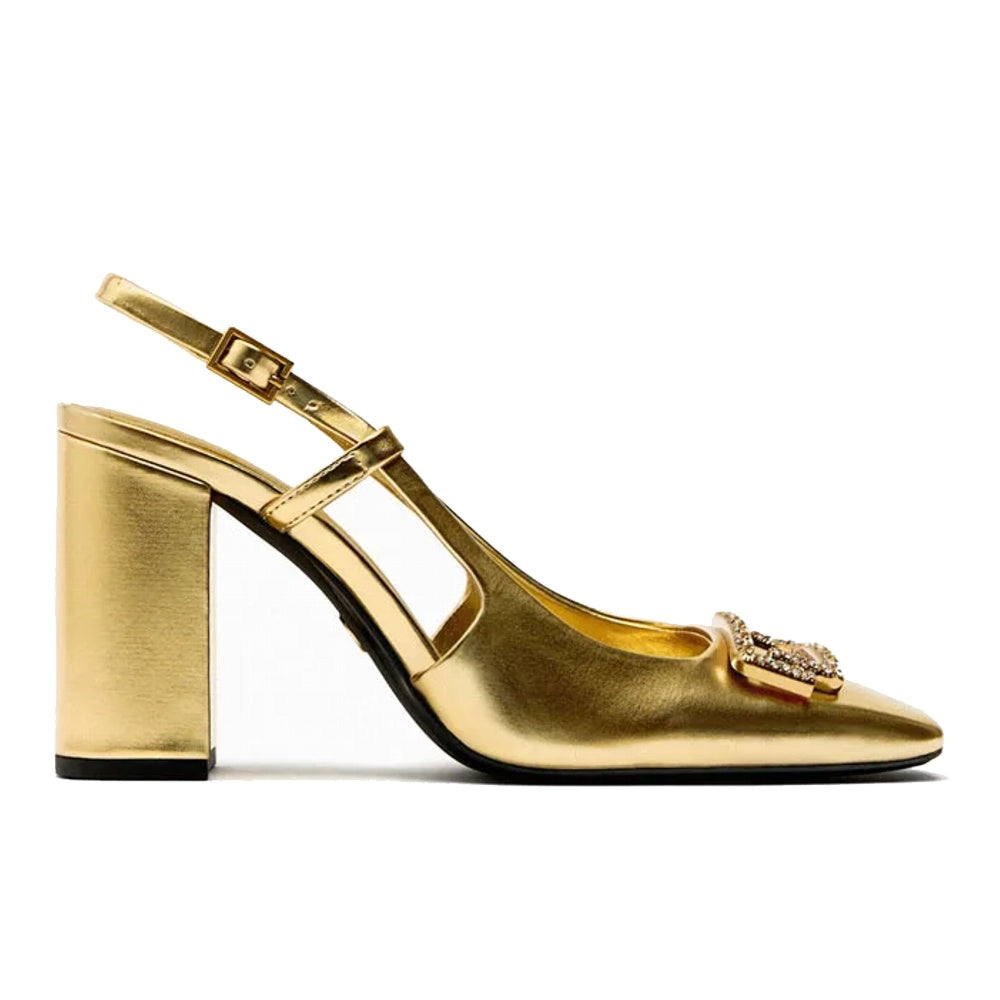 Chic women's sling back heels featuring sparkling rhinestone embellishments, ideal party shoes.