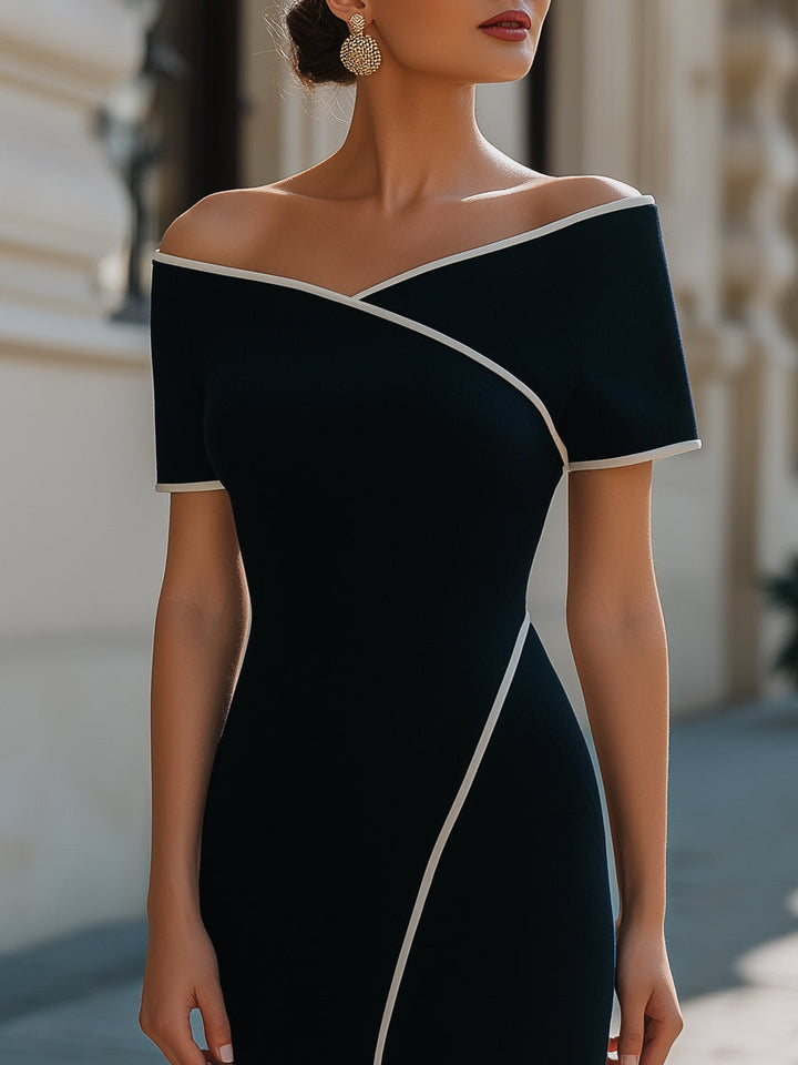 Sophisticated tailored black off-shoulder sheath dress, ideal for formal business or elegant events.