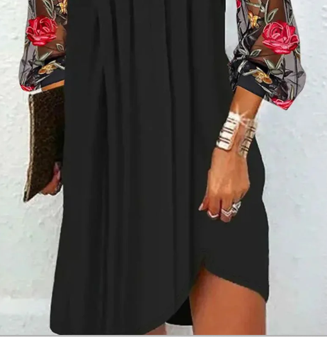 Timeless women's black V-neck cocktail dress showcasing elegant floral embroidered sleeves for a sophisticated look.