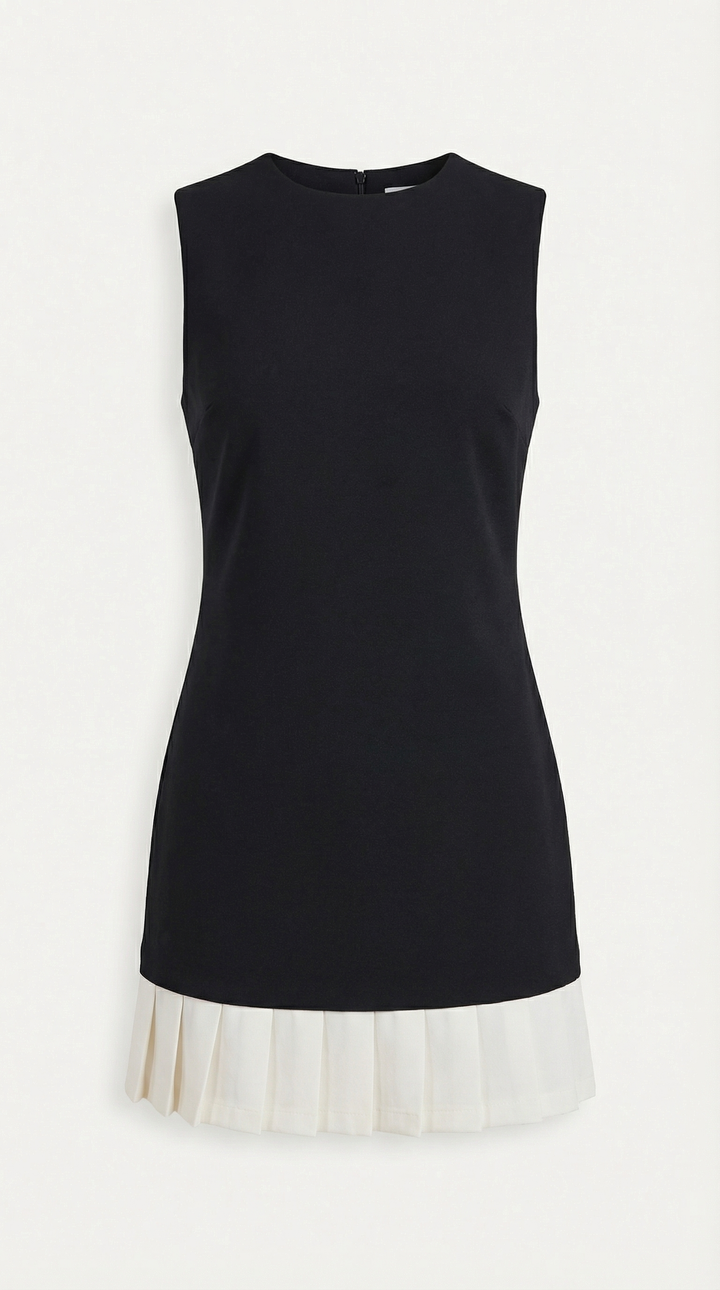 Elegant women's sleeveless black and white midi dress featuring a sophisticated pleated skirt. Chic style.