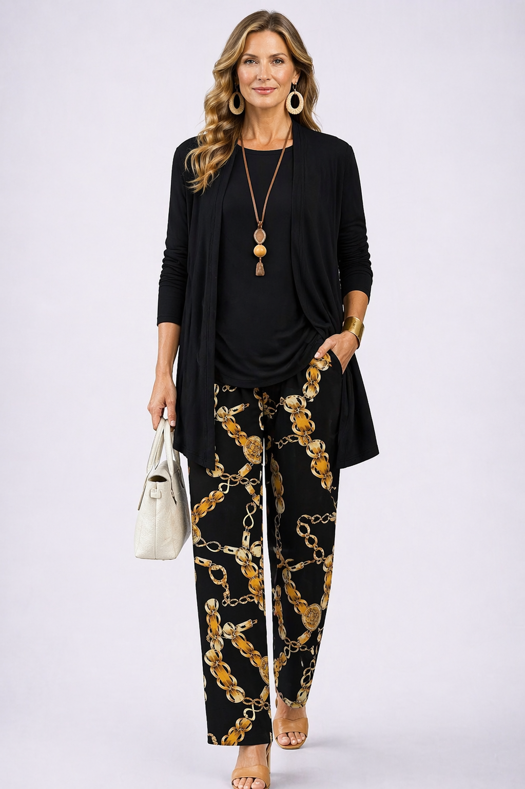 Elegant black women's 3-piece outfit: long-sleeve top, wide-leg pants & cardigan. Versatile casual, lounge & spring/fall wear.