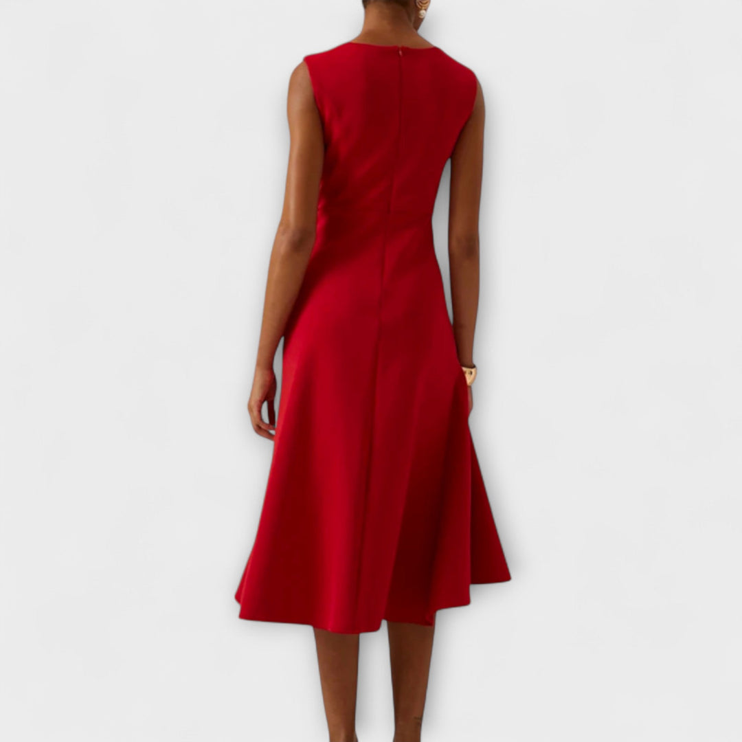 Chic women's sleeveless cocktail midi dress with an asymmetric hem, perfect for parties, formal events, & evening wear.