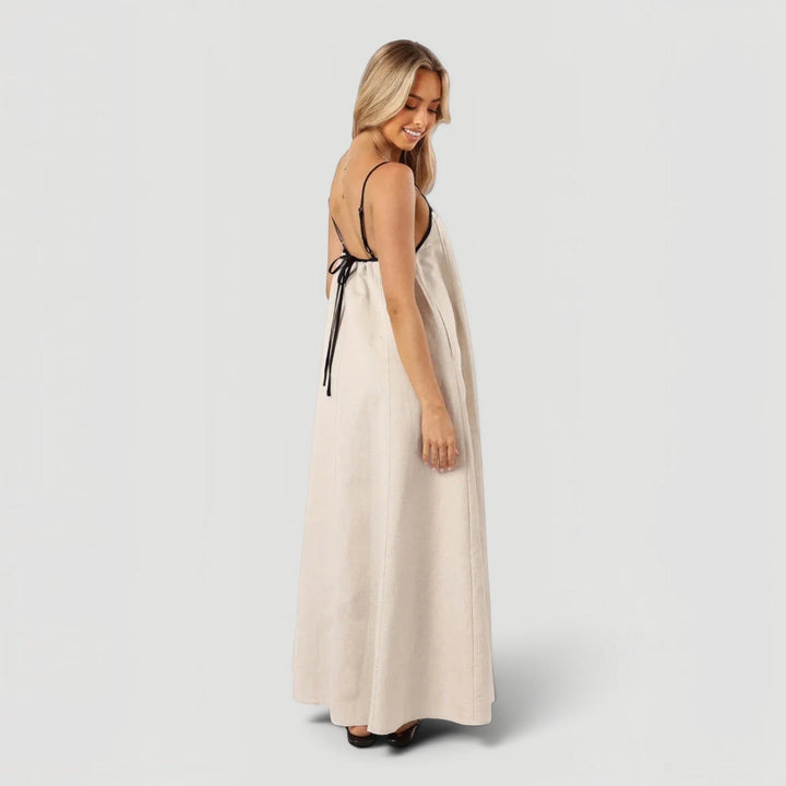 Chic sleeveless a-line midi dress for women, offering elegant casual style for summer events and daily wear.