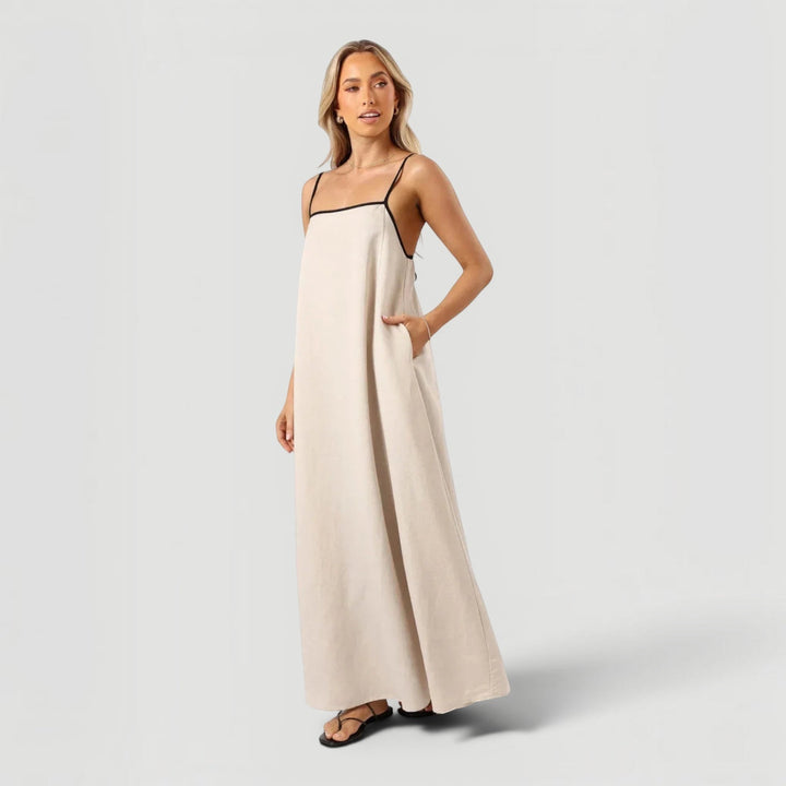 Lightweight, flowy women's summer midi dress. Elegant casual style, perfect for warm weather and comfort.