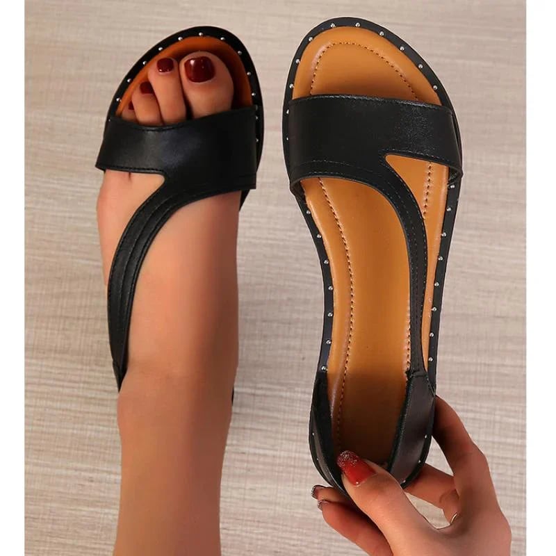 Elegant black women's open-toe sandals, perfect for summer comfort & chic style.