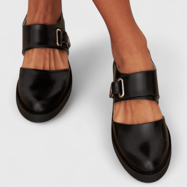 Supportive women's orthopedic Mary Jane flats in black, offering elegant comfort for all-day wear.