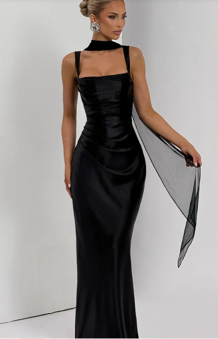 Women's versatile black ruched maxi dress. Elegant summer holiday style with comfortable adjustable straps.