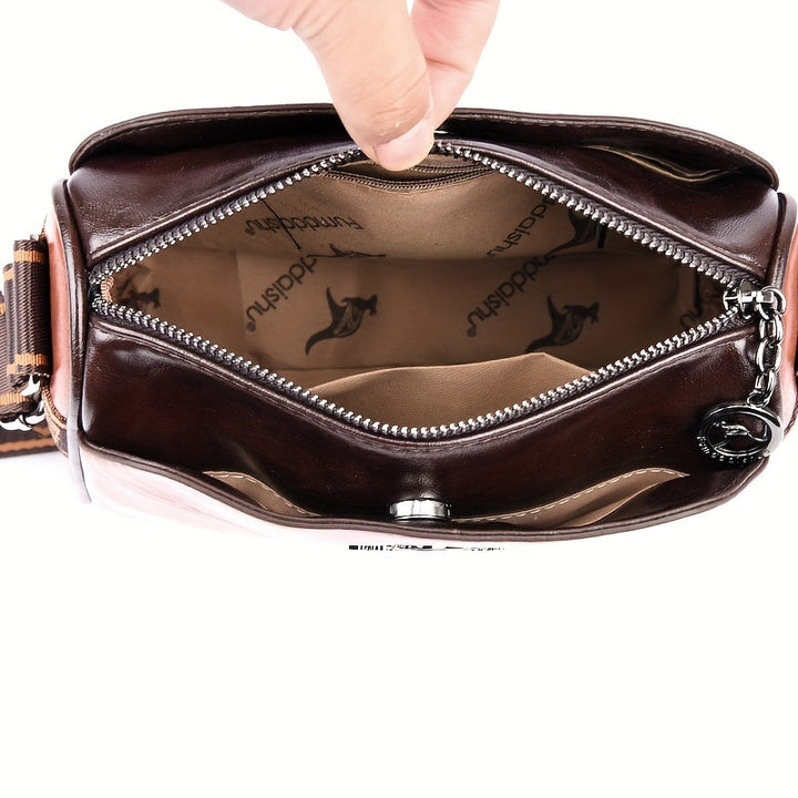 Versatile women's brown shoulder bag. Elegant & organized, with an adjustable strap for chic everyday fashion.