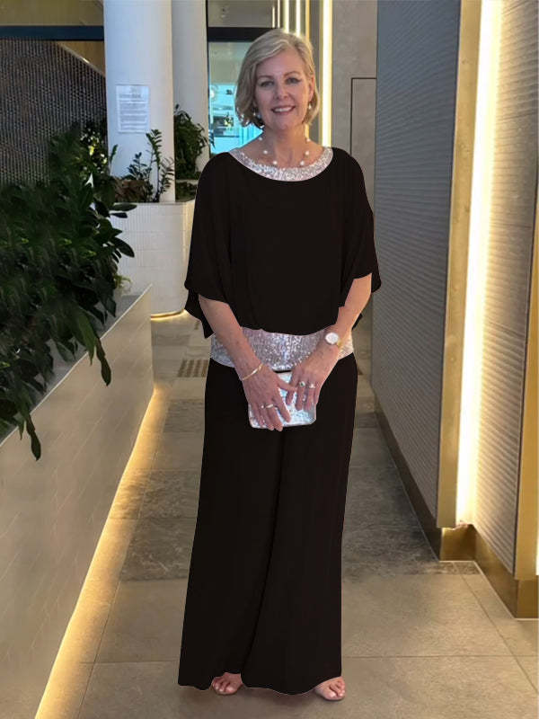 Classy pink women's wide sleeve & wide leg pants set. Comfortable two-piece outfit for formal events.