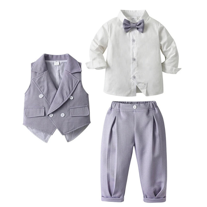 Kids' blue wedding guest suit, a 3-piece formal outfit for boys' special day.