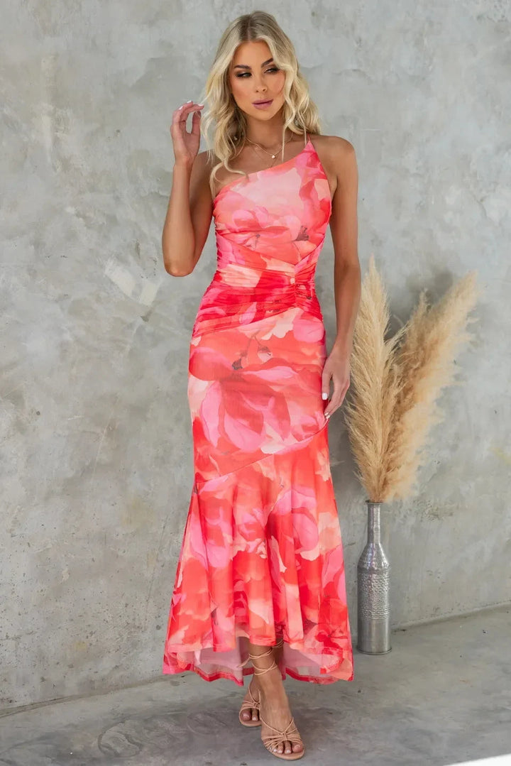 Chic women's one-shoulder ruched floral midi dress with high-low hem, ideal for summer vacations & parties.