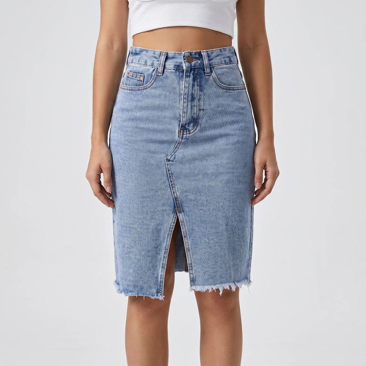 Women's sophisticated pleated midi skirt in blue. Features a flattering high-waisted design for elegant everyday wear.