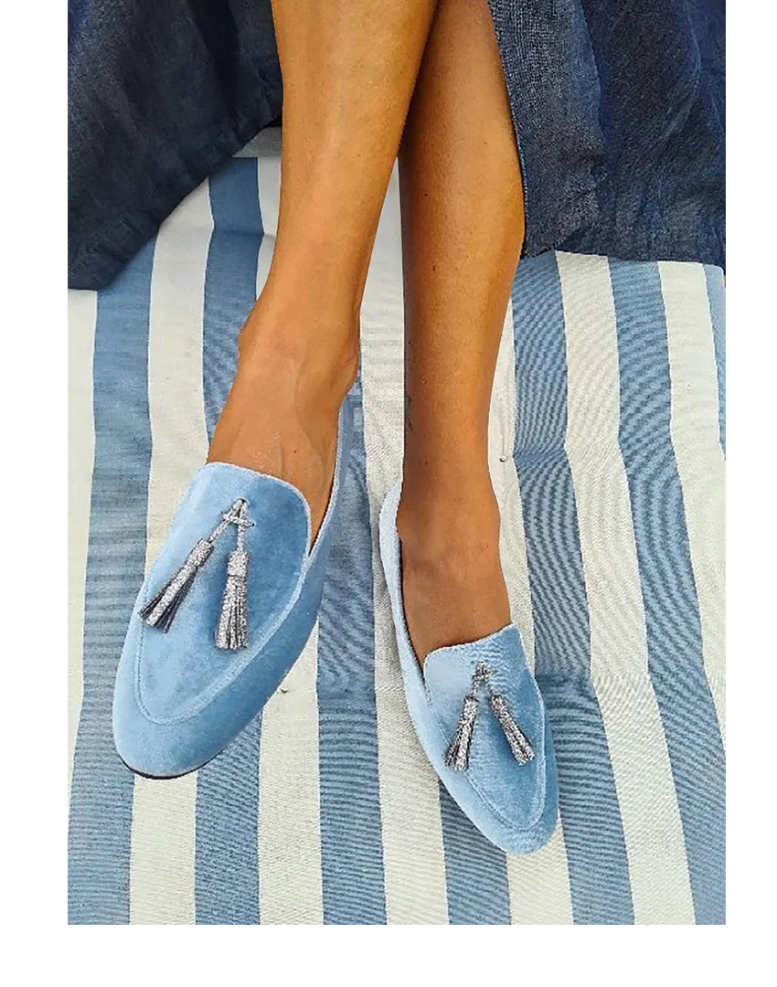 Elegant blue women's slip-on loafers with tassel detail. Comfortable casual flats for everyday fashion footwear.