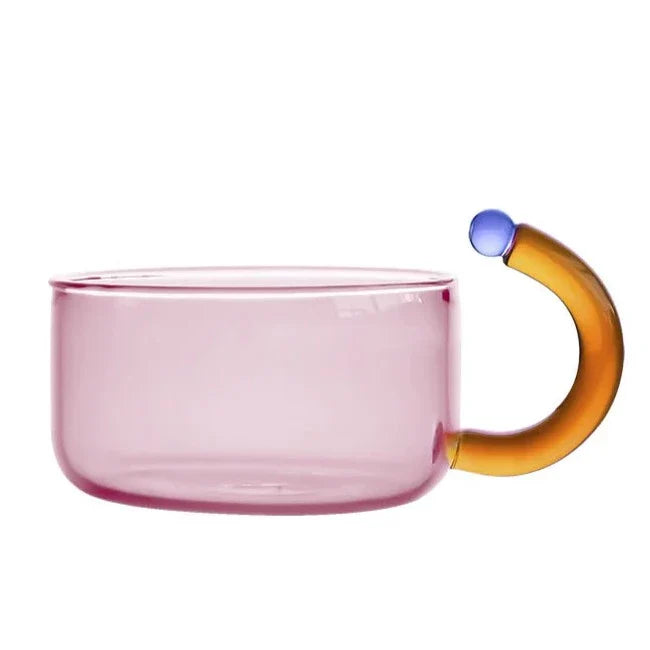 Borosilicate glass tea set, elegantly arranged on a table for serving. Beautiful & functional home decor item.