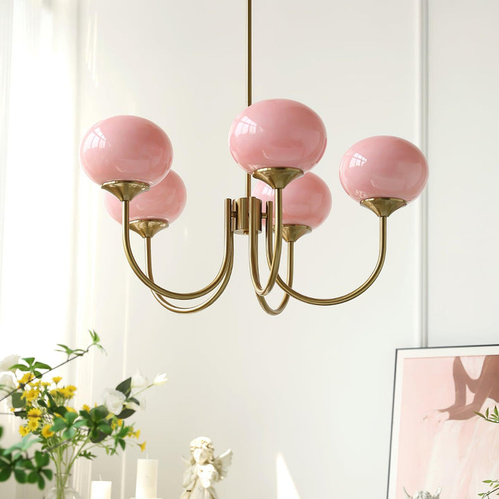 Elegant brass circle pendant lamp with glass spheres for modern living rooms.