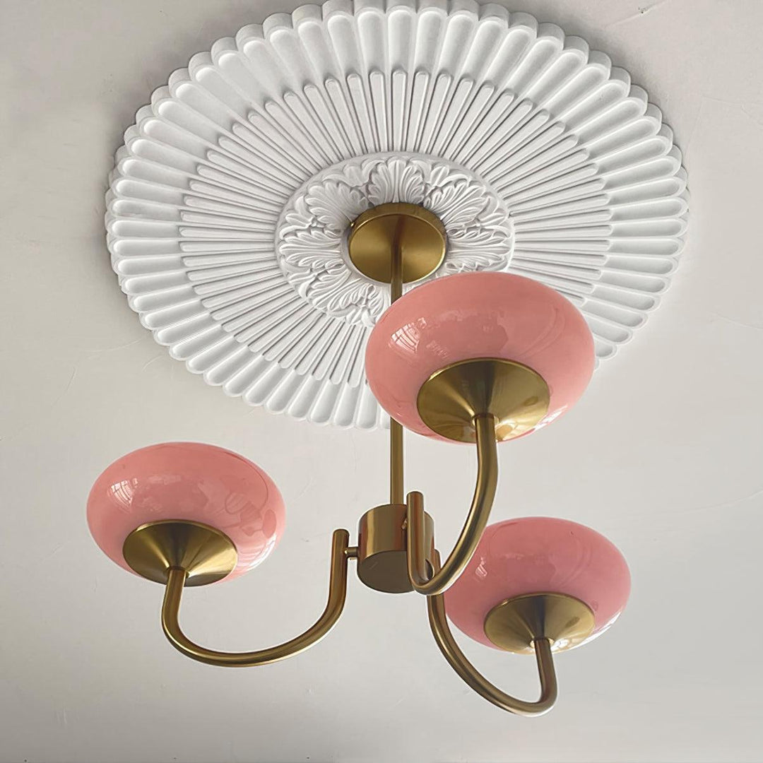 Elegant gold-finish circle pendant, with glass spheres for a stylish living room.