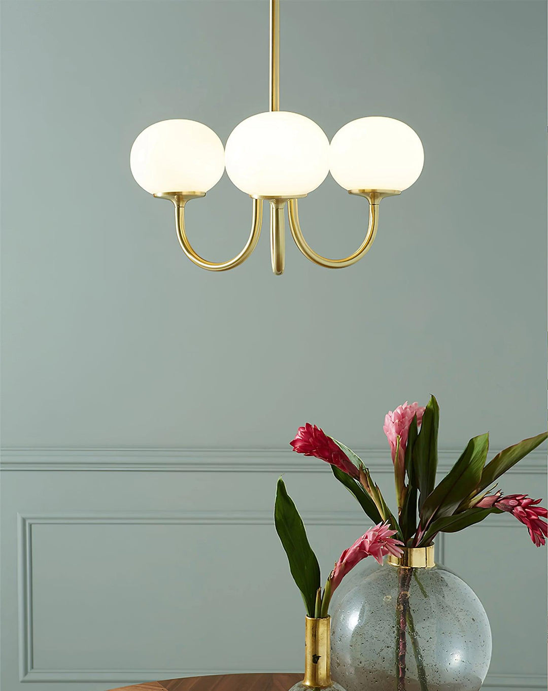 Chic brass pendant lamp, a minimalist ring design for modern living spaces.