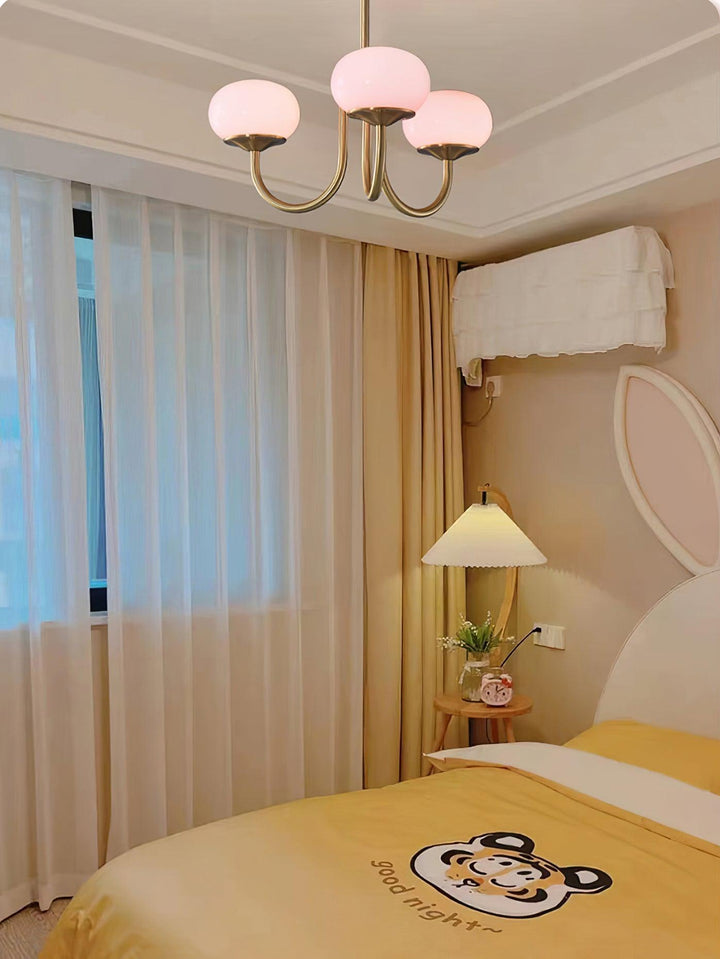 Minimalist gold-finish circular pendant, sleek design for ambient lighting.