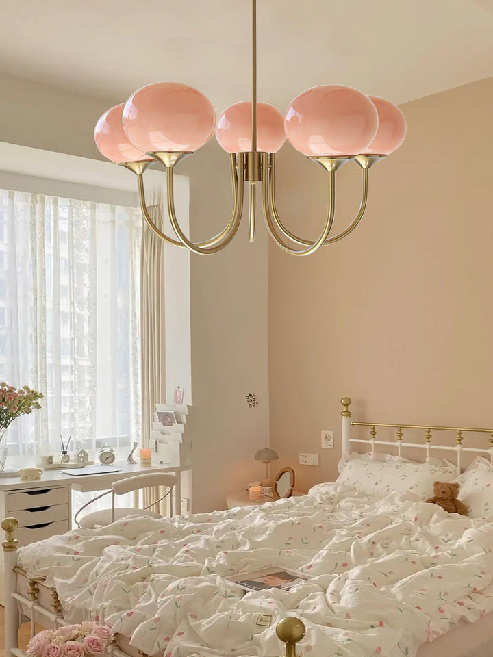 Unique brass circle lamp, a contemporary ceiling light with frosted glass shades.