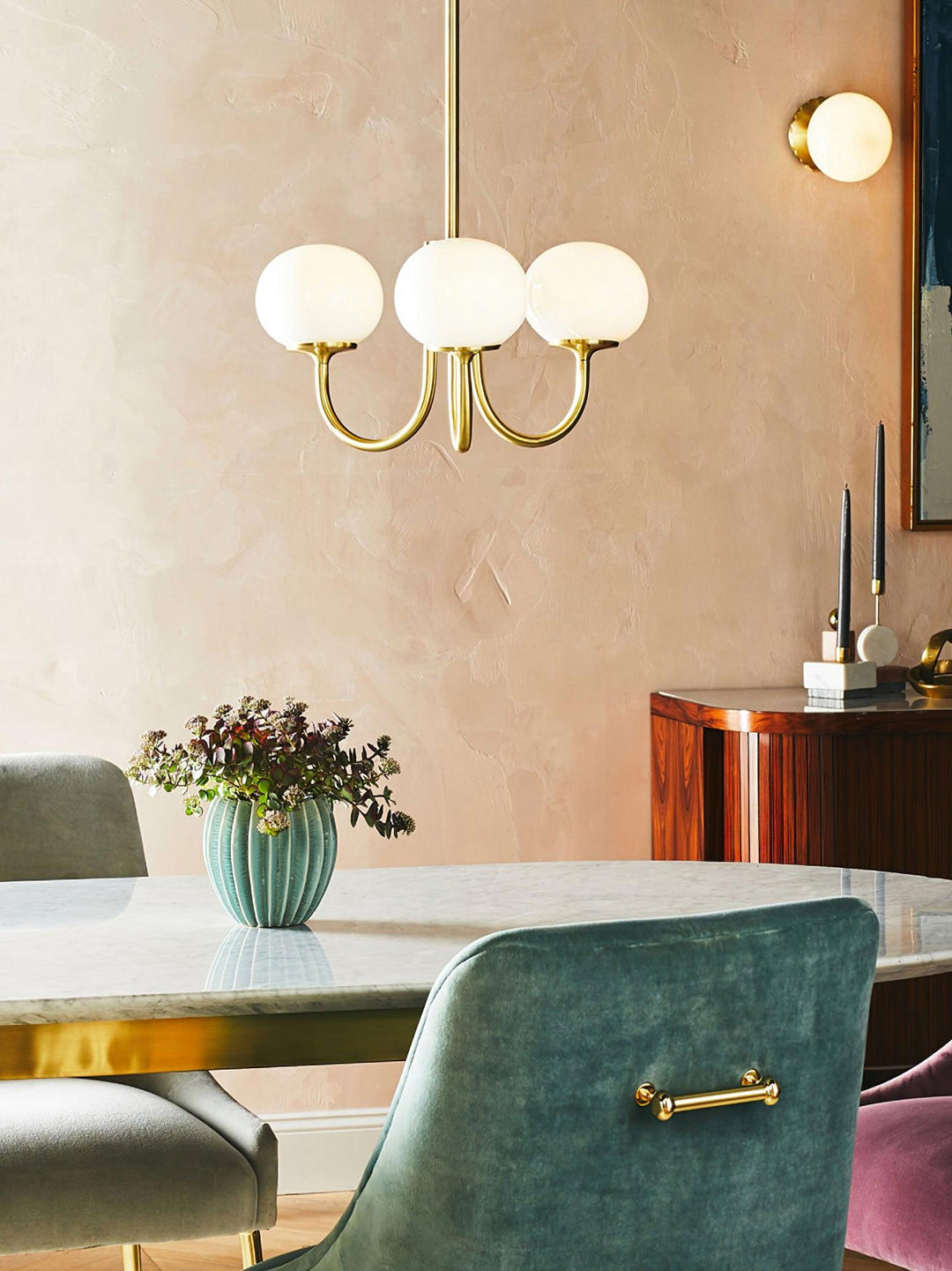 Modern brass pendant, a stylish circle lamp with glass spheres for any room.