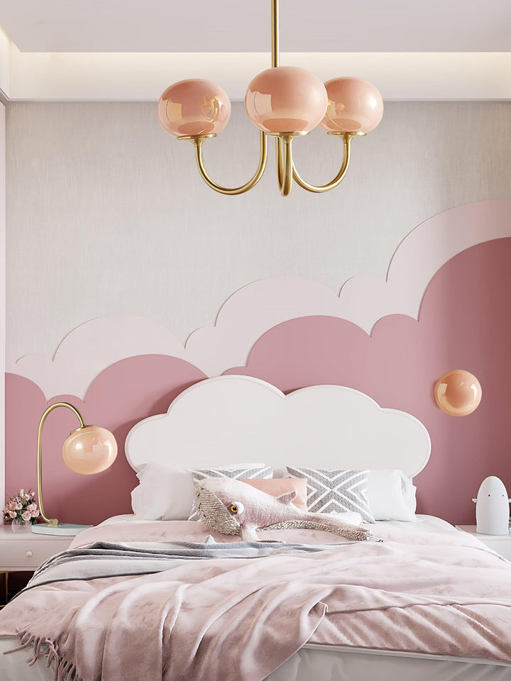 Elegant chrome circular ceiling light with glass spheres for modern dining.
