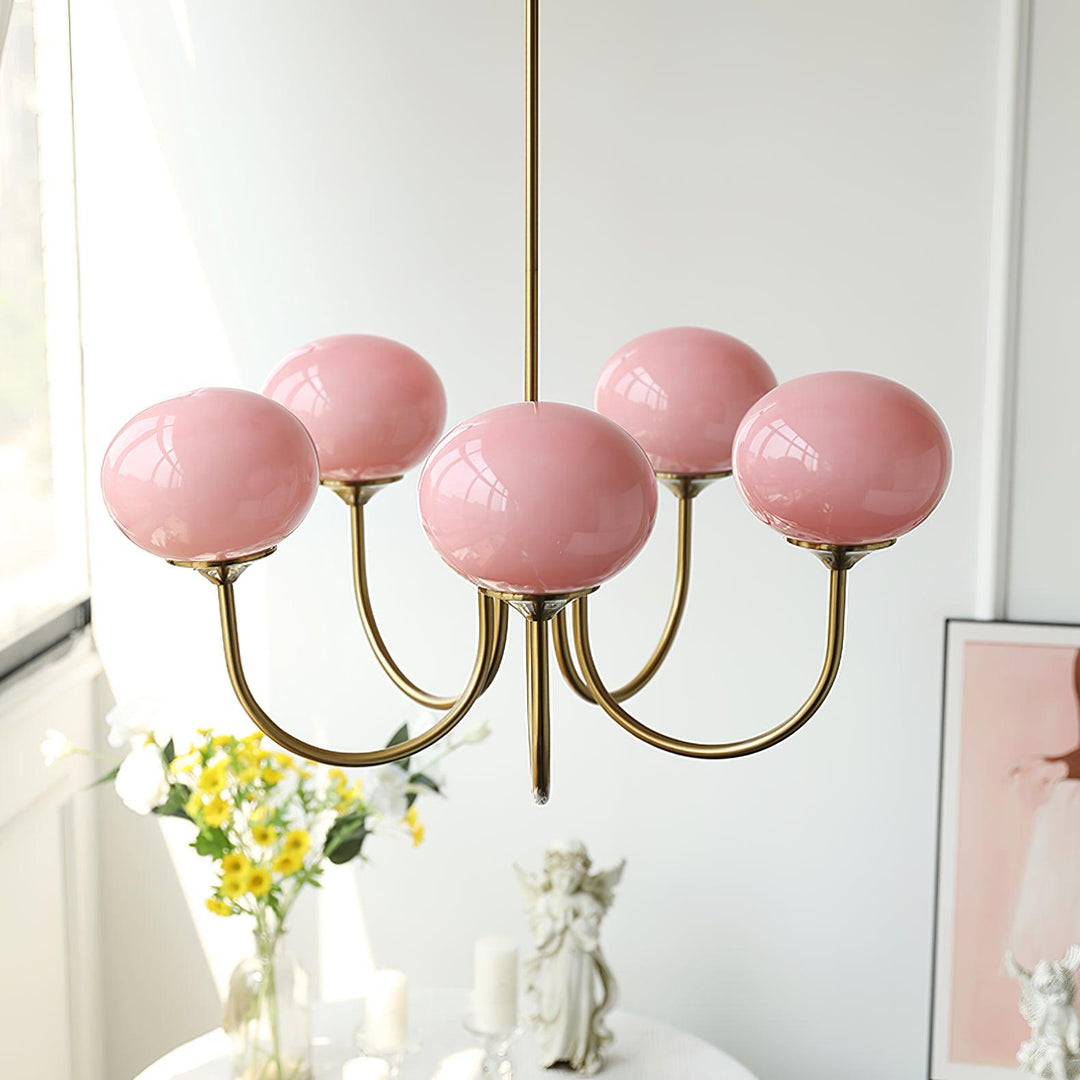 Sophisticated brass pendant lamp, a circle design with glass spheres for elegant dining.