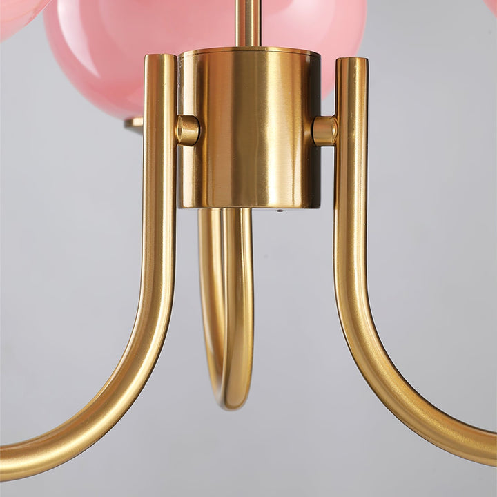 Unique silver-finish pendant lamp, a modern circle design with glass spheres.