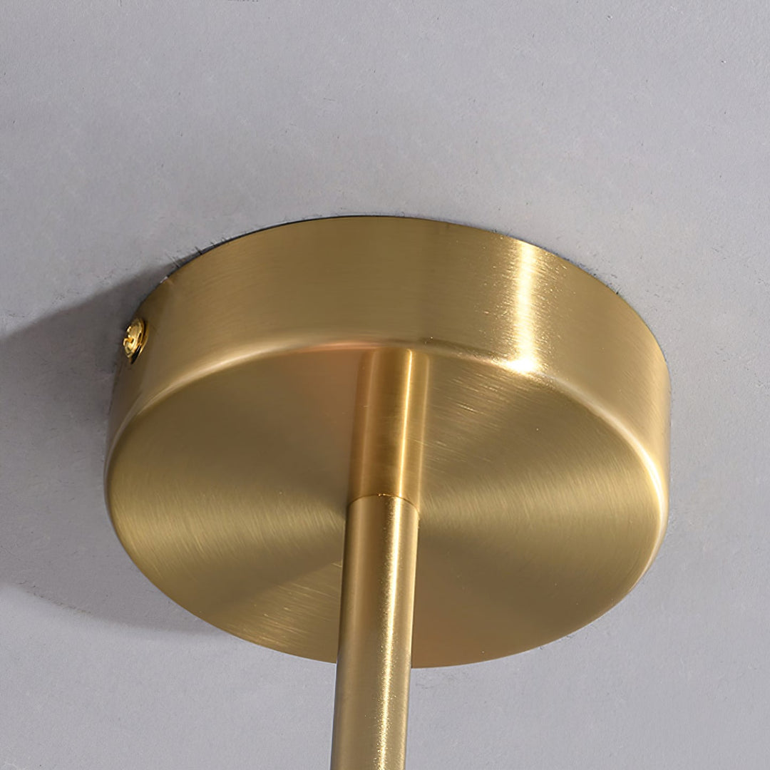 Elegant chrome circle ceiling light, a modern pendant for sophisticated dining.