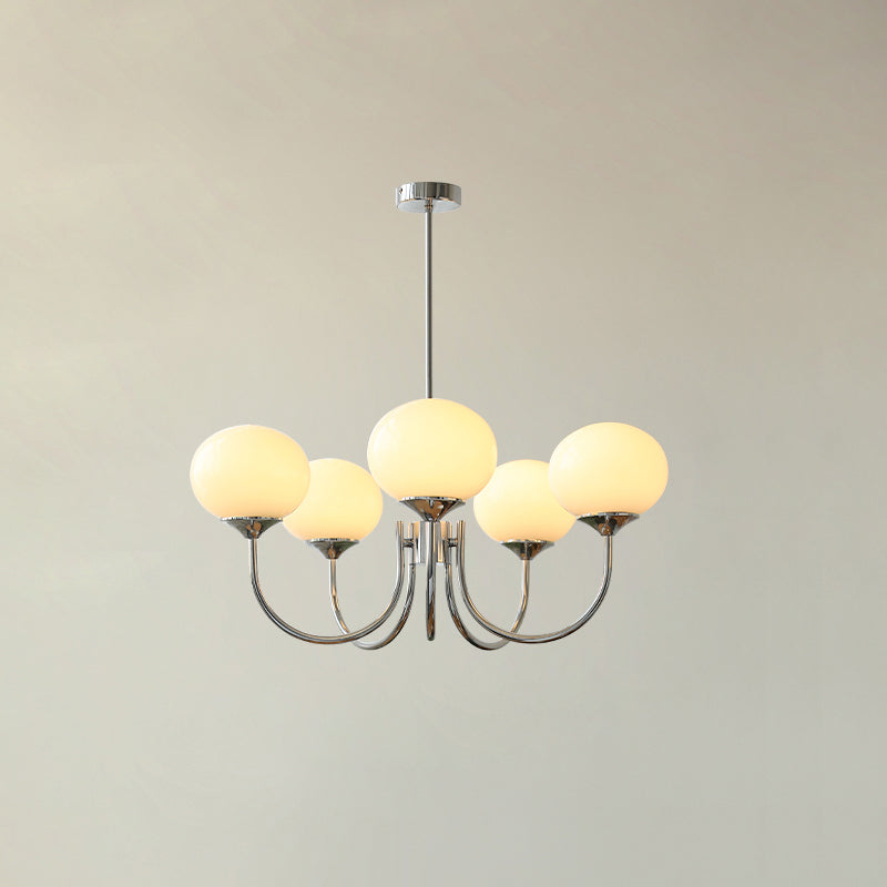 Chic chrome circular pendant, a sophisticated overhead fixture for any room.