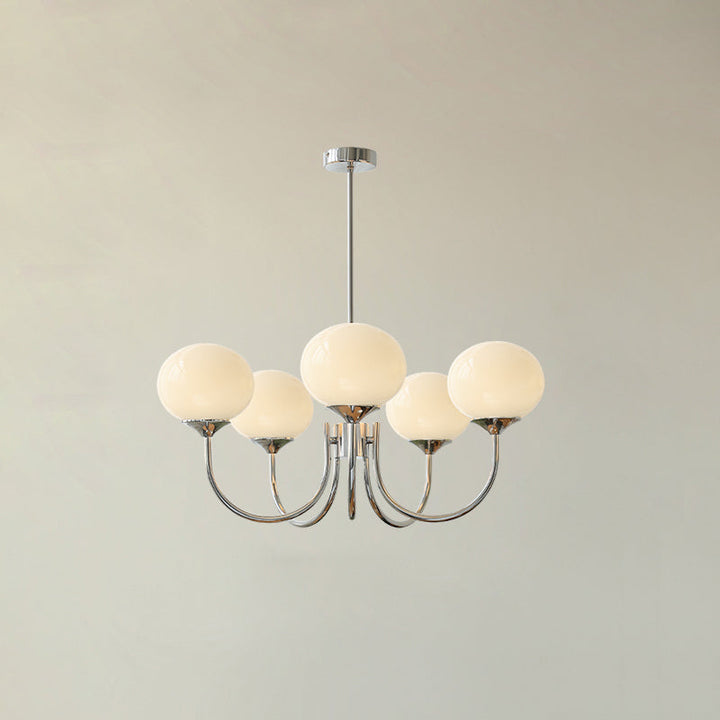 Sophisticated gold-finish circle lamp, a luxurious pendant with glass spheres.