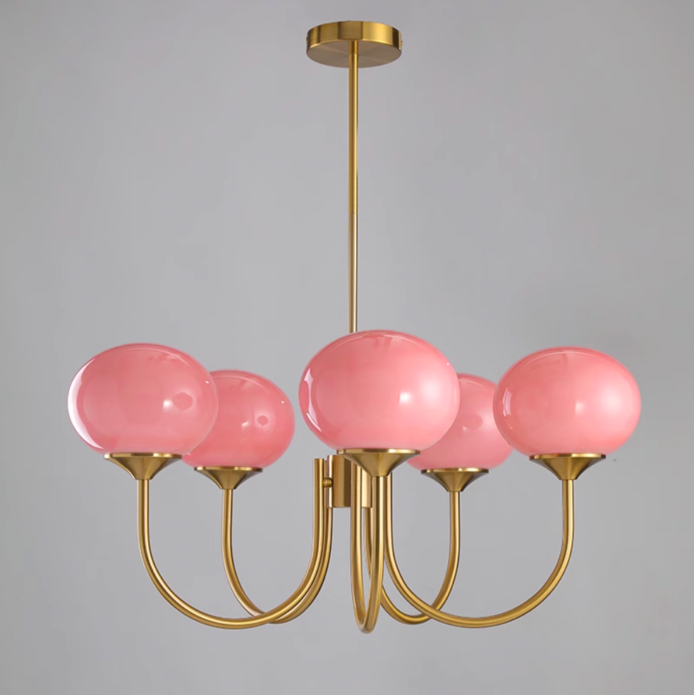 Minimalist chrome circular pendant, ambient illumination for contemporary dining.