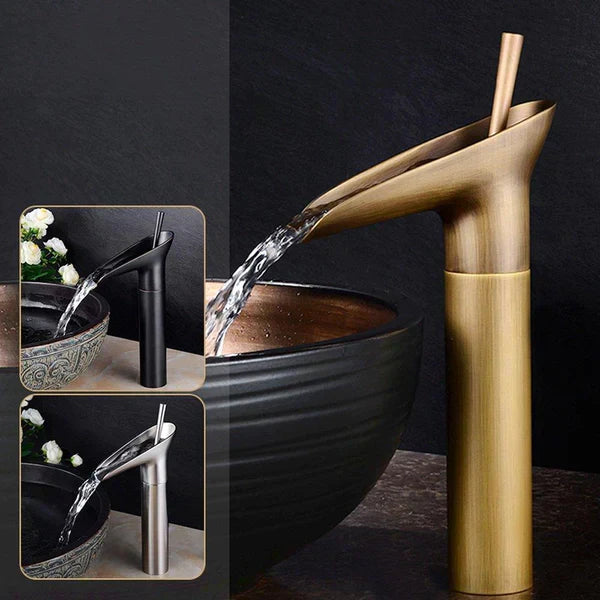 Elegant antique brass waterfall faucet, decorative bathroom basin tap.
