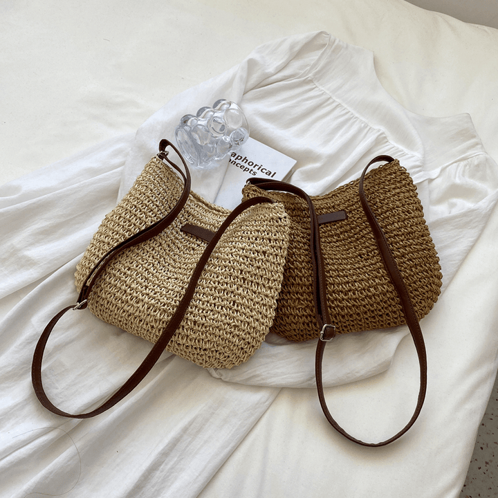 Chic two-tone brown and beige women's handbag, perfect for versatile everyday use.