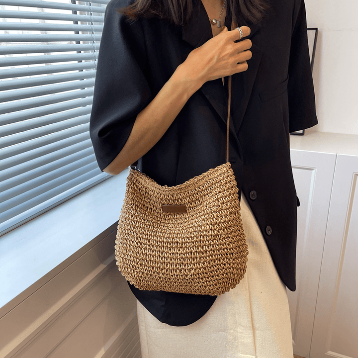 Fashionable brown & beige women's bag, an elegant and versatile accessory for daily style.