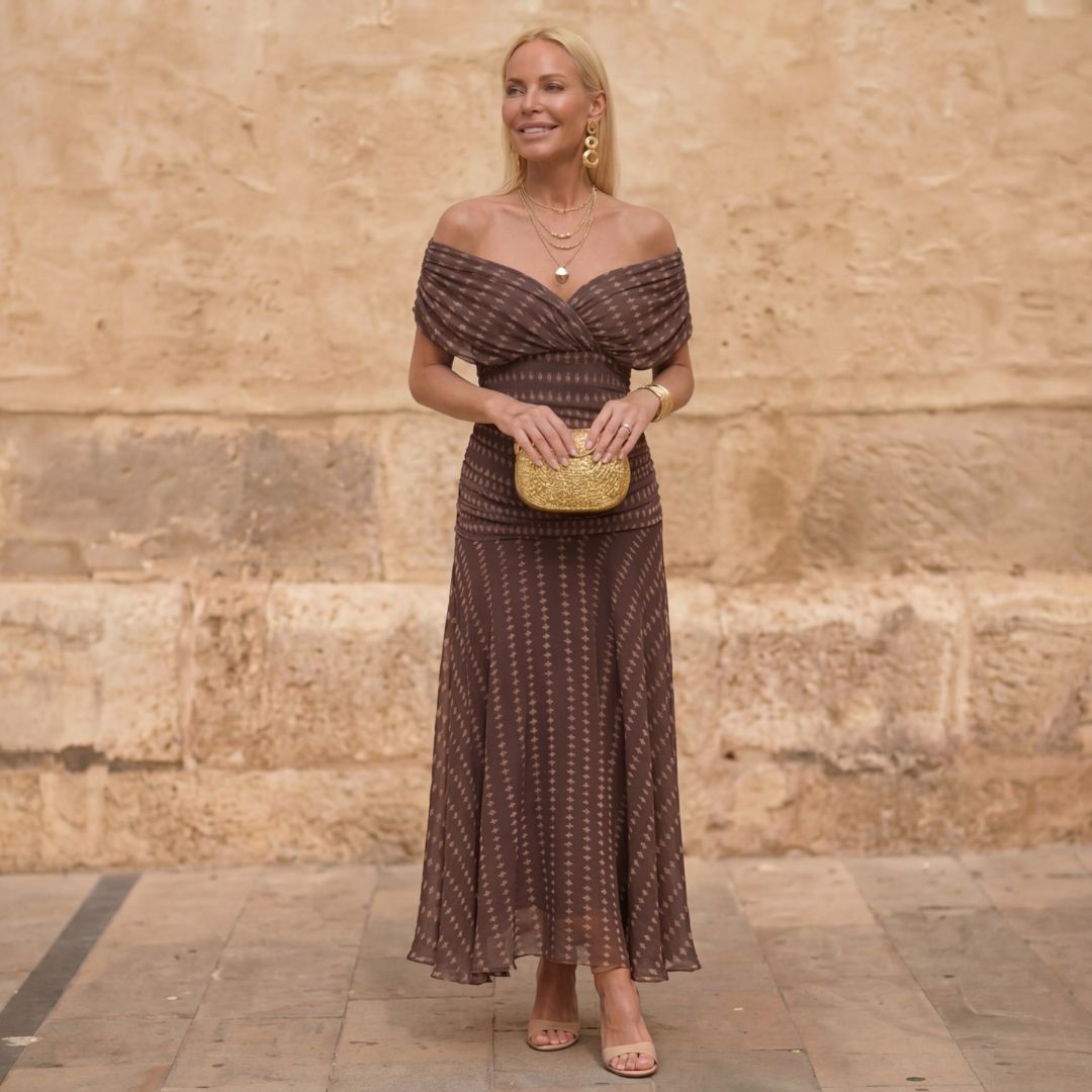 Elegant brown women's off-shoulder maxi dress with geometric print, perfect for evening wear or special occasions.