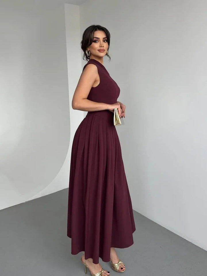 Women's elegant burgundy one-shoulder maxi dress with a flattering drape, ideal for formal events.