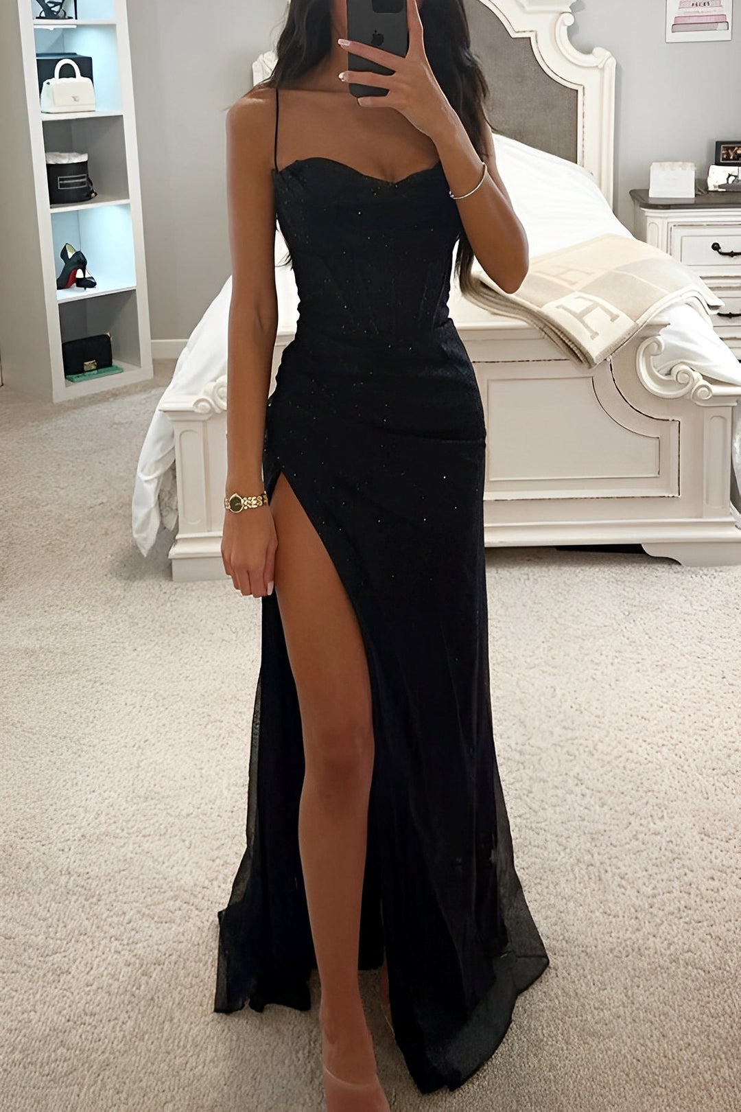Elegant women's spaghetti strap corset maxi dress with a high slit. Formal evening wear or prom gown.