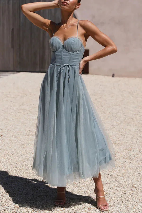 Chic women's cocktail dress: a corset midi with spaghetti straps, perfect for parties & events.