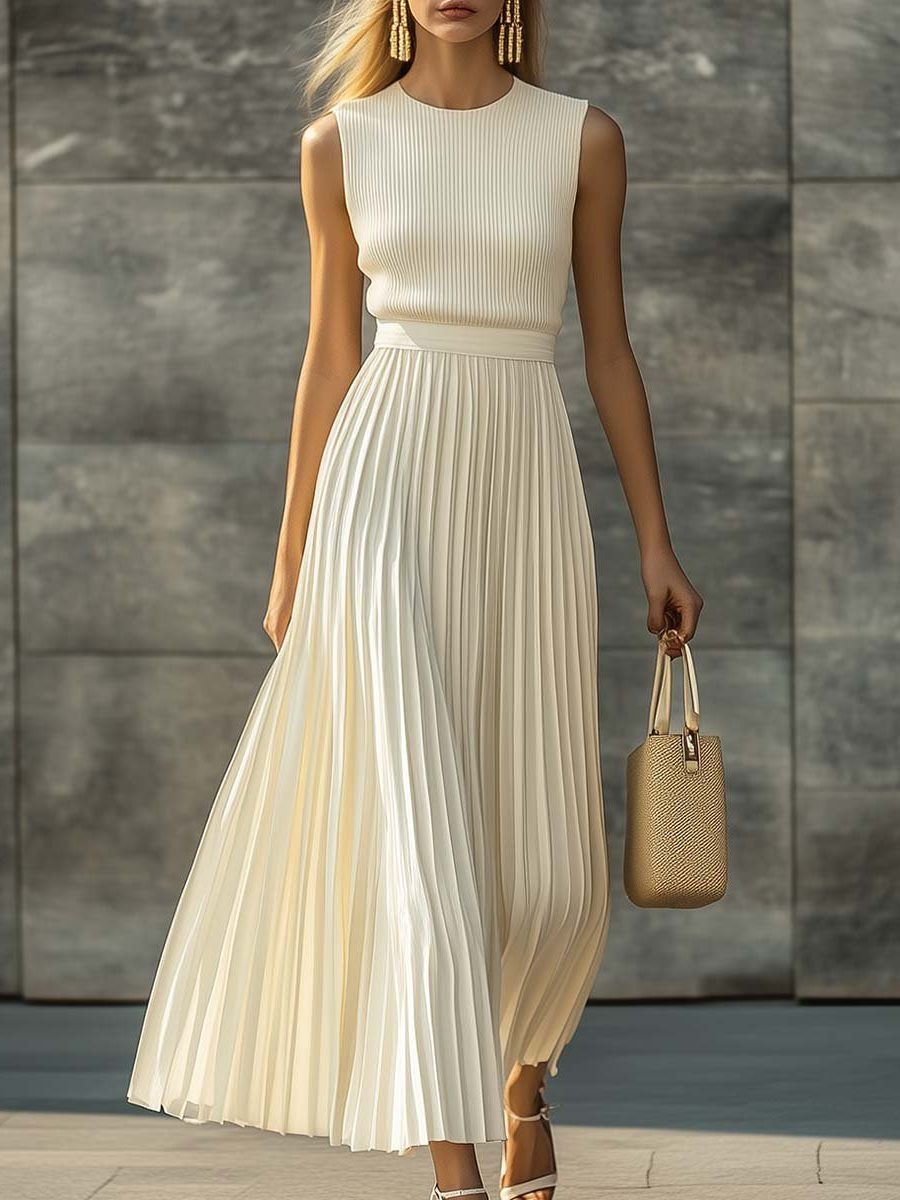 Elegant cream sleeveless pleated maxi dress for women. Perfect for formal events & parties. Sophisticated evening wear.