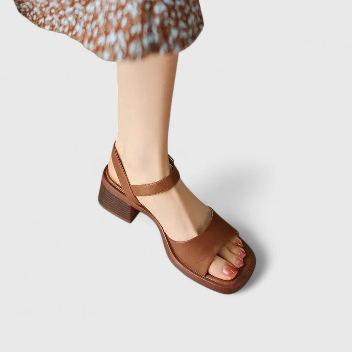 Chic women's square toe sandals in cream white, featuring slim straps & vintage style for comfortable summer wear.