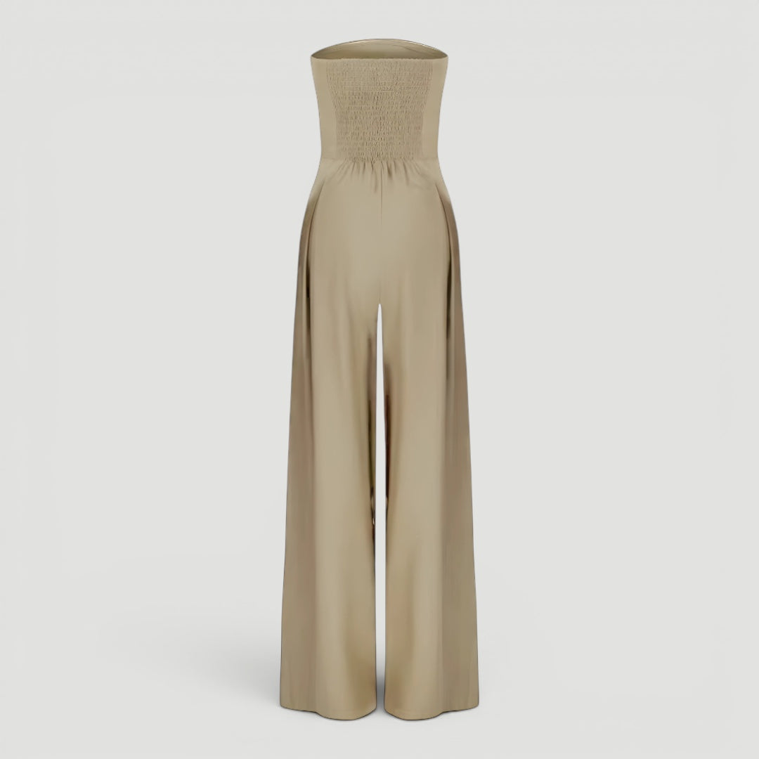 Timeless women's strapless wide leg jumpsuit in dark blue. Effortless elegance for evening wear & special events.