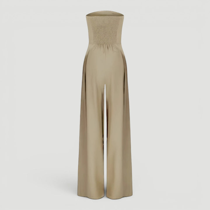 Timeless women's strapless wide leg jumpsuit in dark blue. Effortless elegance for evening wear & special events.