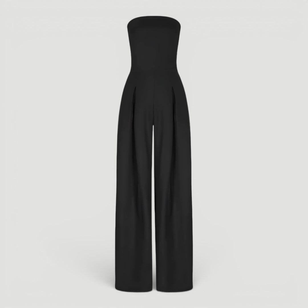 Elegant dark blue women's wide leg strapless jumpsuit. Perfect evening wear or party outfit for timeless fashion.