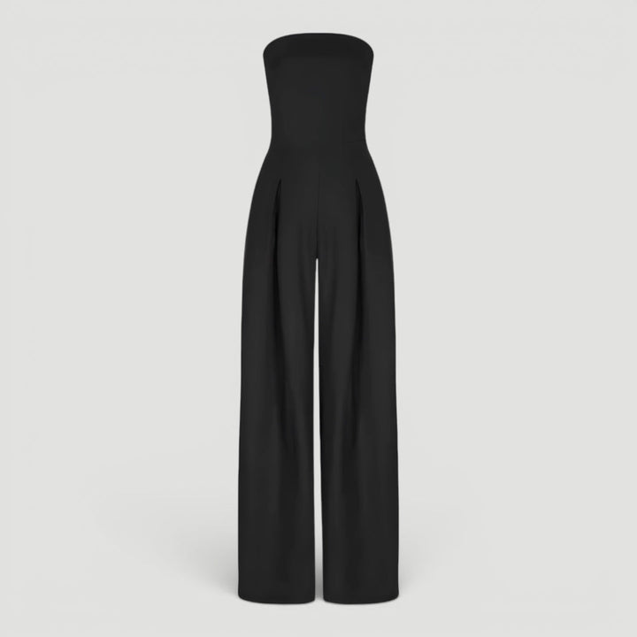 Elegant dark blue women's wide leg strapless jumpsuit. Perfect evening wear or party outfit for timeless fashion.