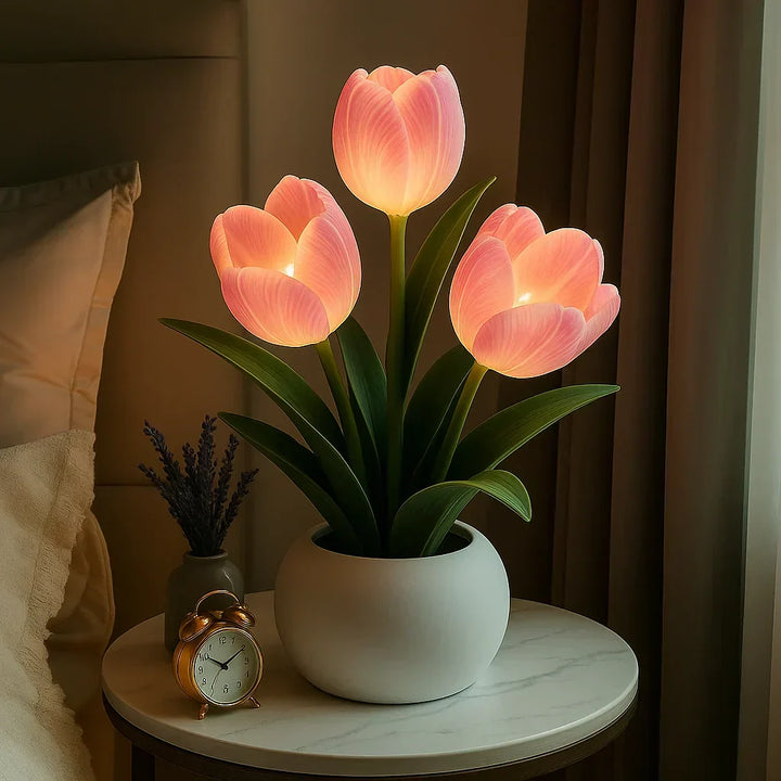 Close-up of a beautiful tulip LED table lamp with soft, dimmable warm light, ideal for ambient bedroom decor.