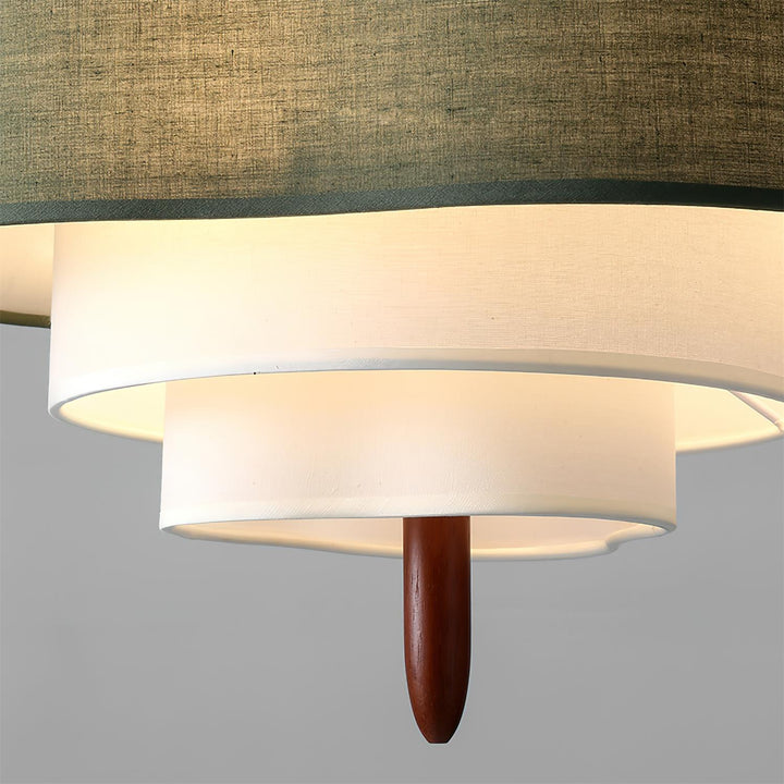 Fabric shade pendant light with wooden accents. Modern home decor lighting.
